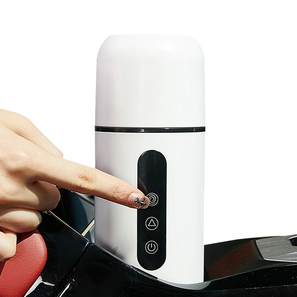 Portable electric kettle coffee cup with smart heating technology, ideal for travel.