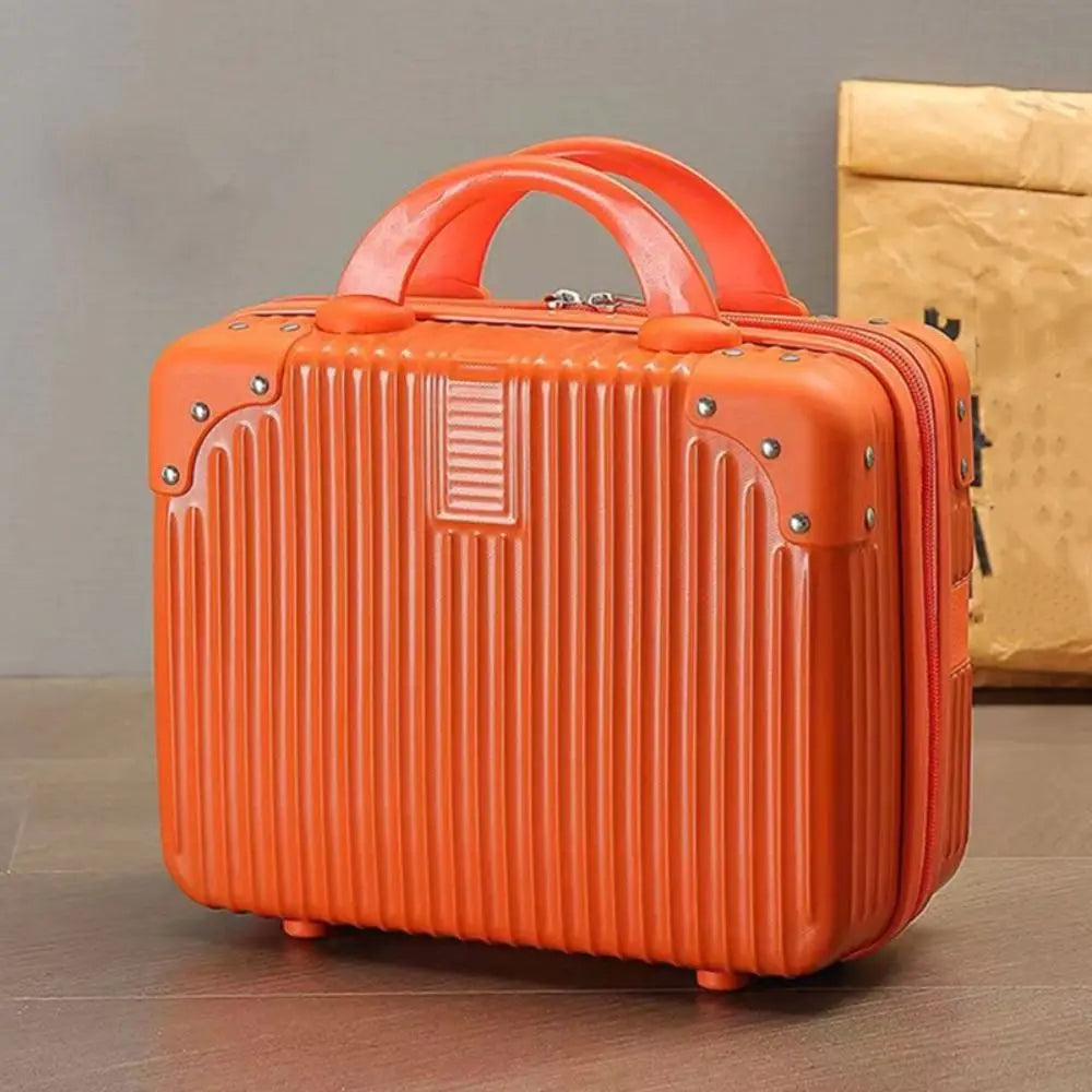 Orange hand luggage makeup case with a vibrant design, measuring 30cm x 23cm x 15.5cm, ideal for travel and beauty storage